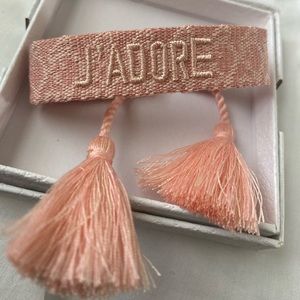 Light pink Christian Dior woven thread bracelet